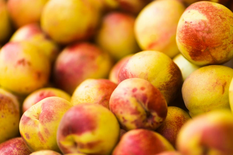 apples are stacked on top of each other