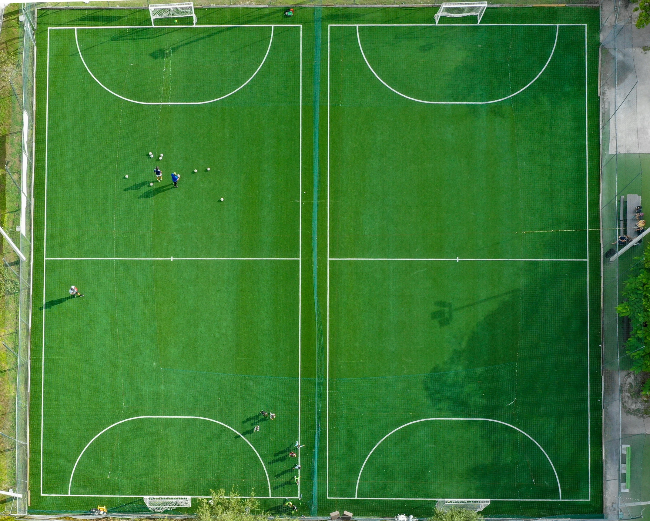 aerial view of an artificial soccer pitch with markings