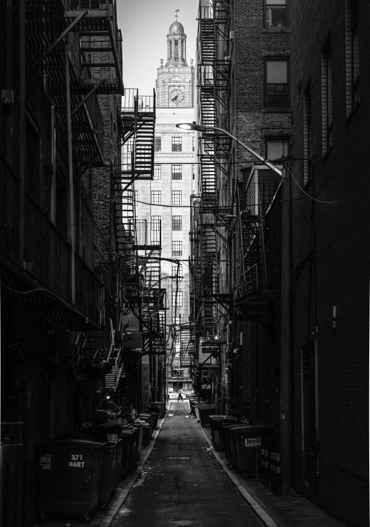 a narrow alleyway with buildings along it