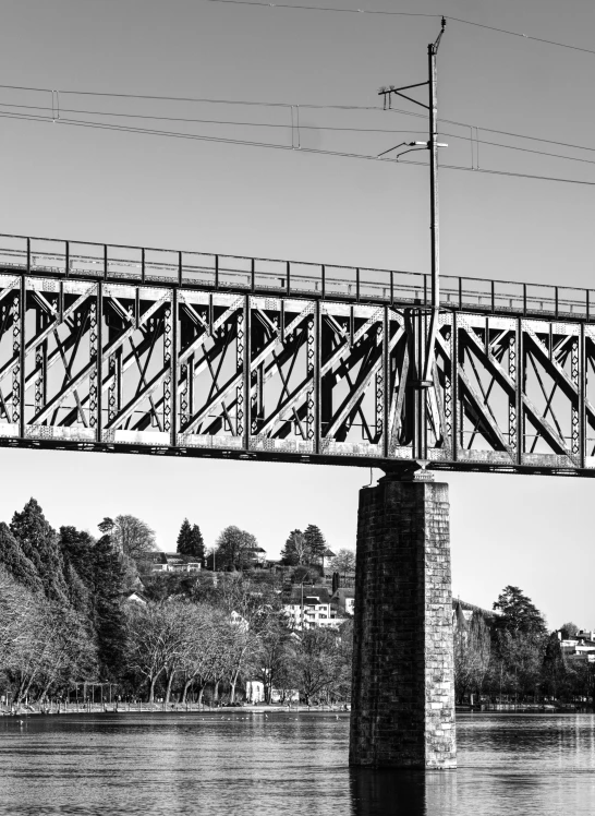 the railroad bridge has many supports on it