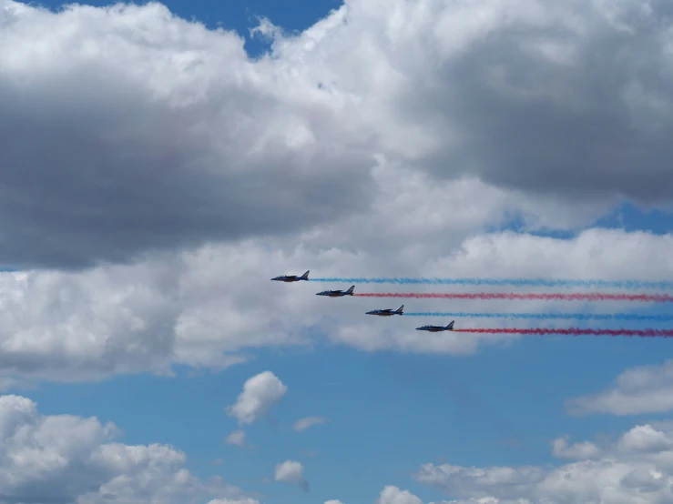 several jets fly in formation during a show