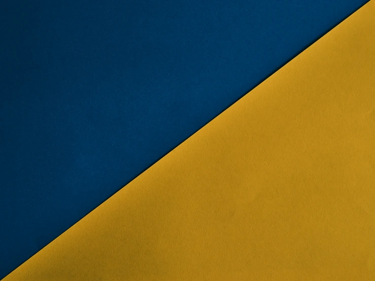 a closeup view of a gold, blue and black wall