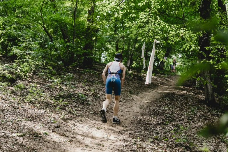 a person riding a bicycle on a trail