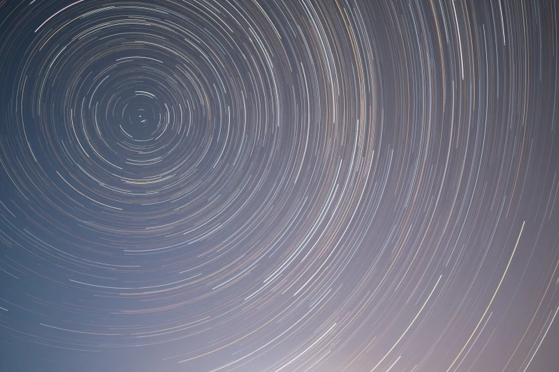 a circle of stars that are flying in the sky