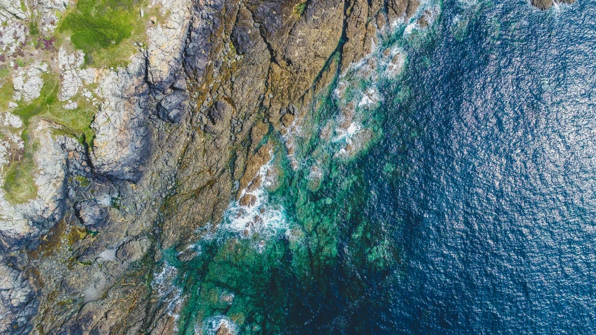 an aerial view of the earth, showing land, and water