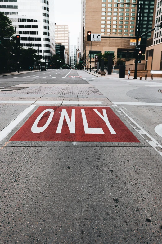 a street has only one red street sign in it