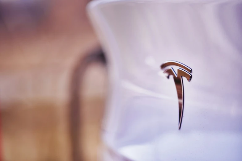 a close up of a shiny silver metal object