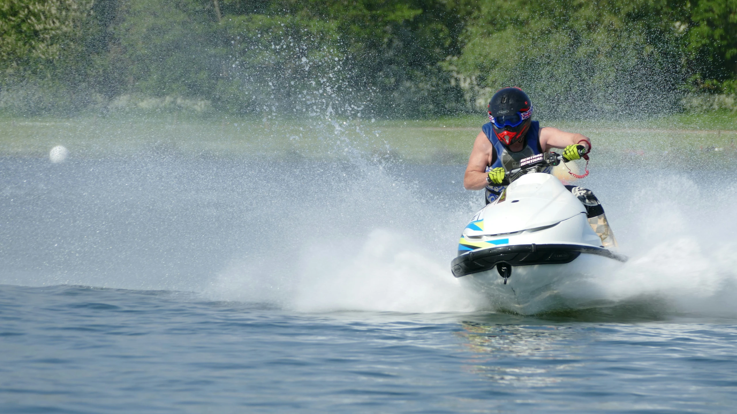 a person riding a jet ski on top of a lake