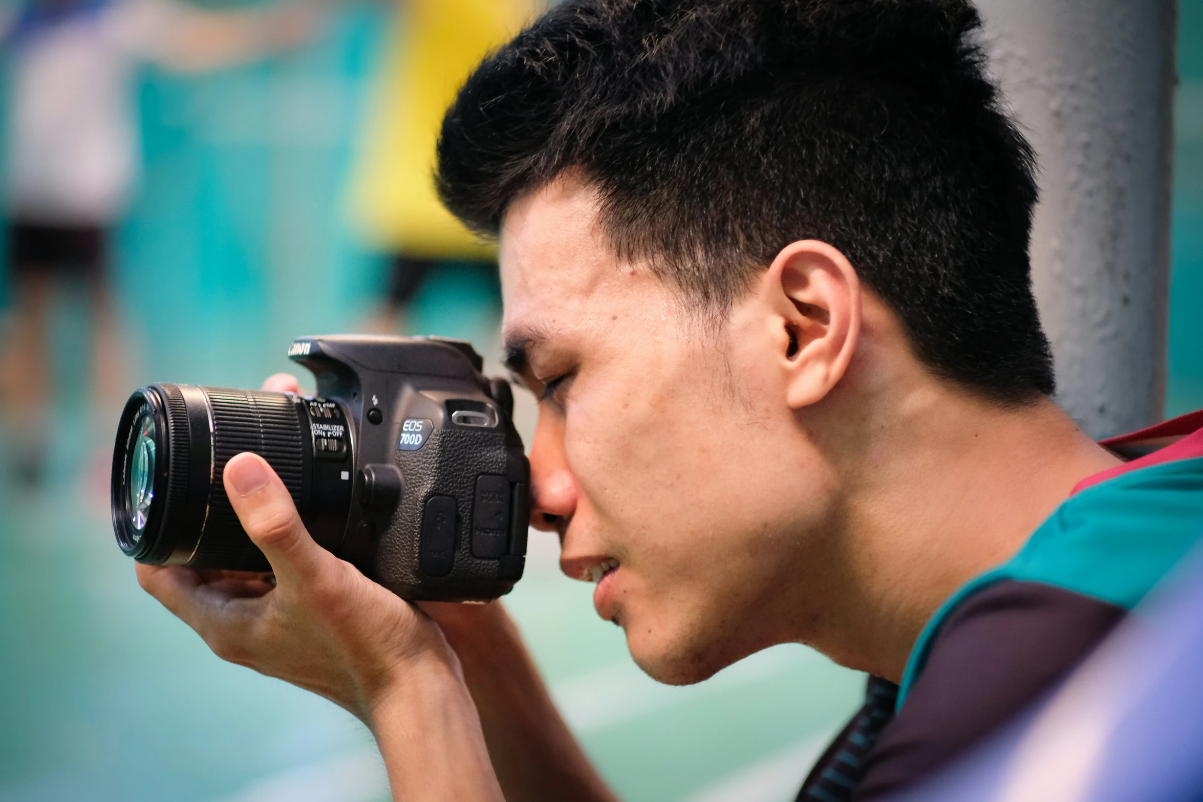 a person taking a picture with a camera