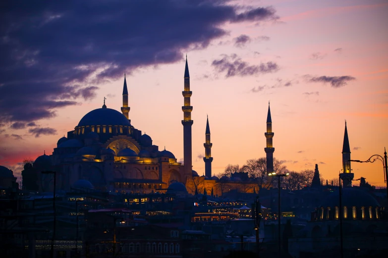 a sunset view of the blue mosque, also a landmark