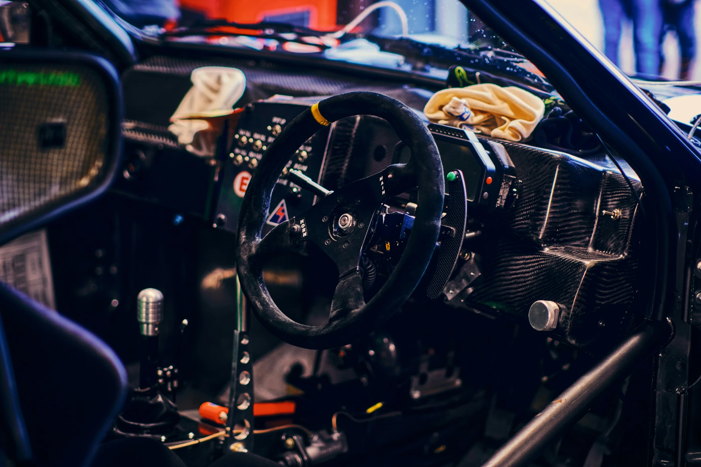 the dashboard of an old classic car, complete with the steering wheel