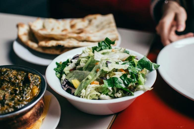 an up close picture of a white bowl of food