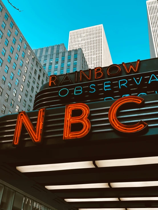 a red neon sign that says the words rainbow in observations nbc