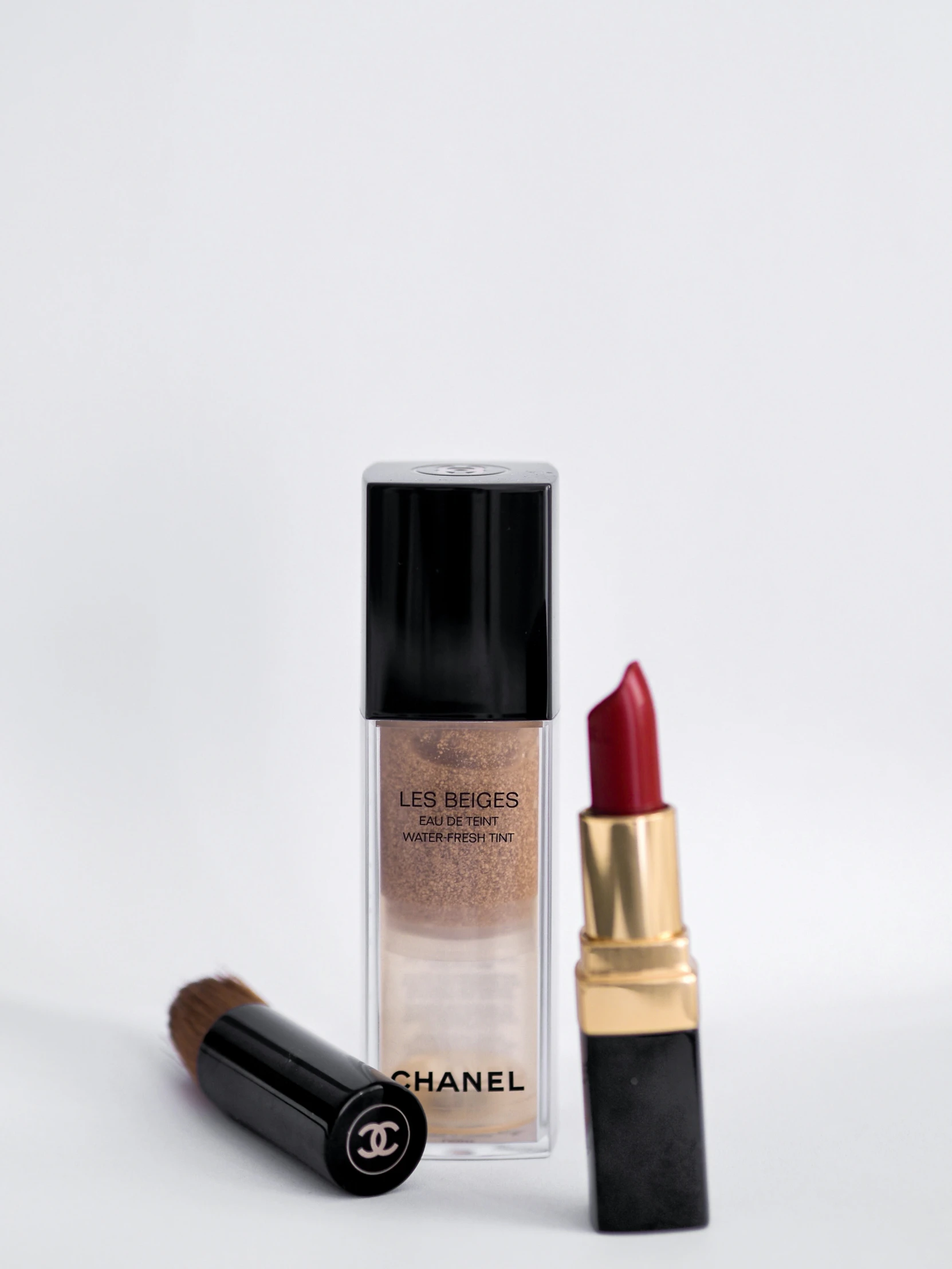 a pair of lipstick and foundation shades from chanel