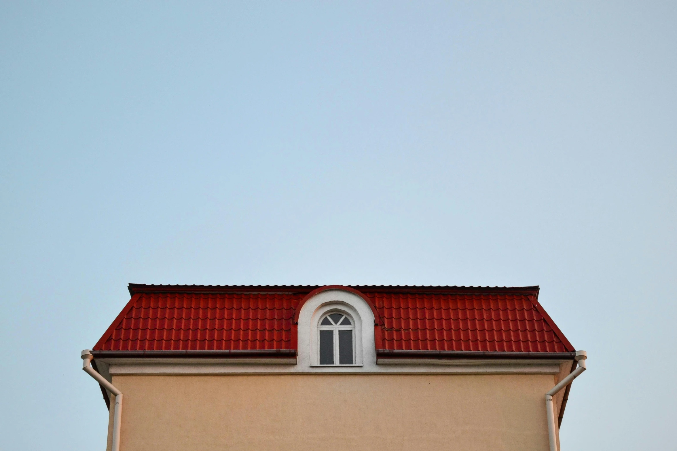 the front view of a tower with a clock