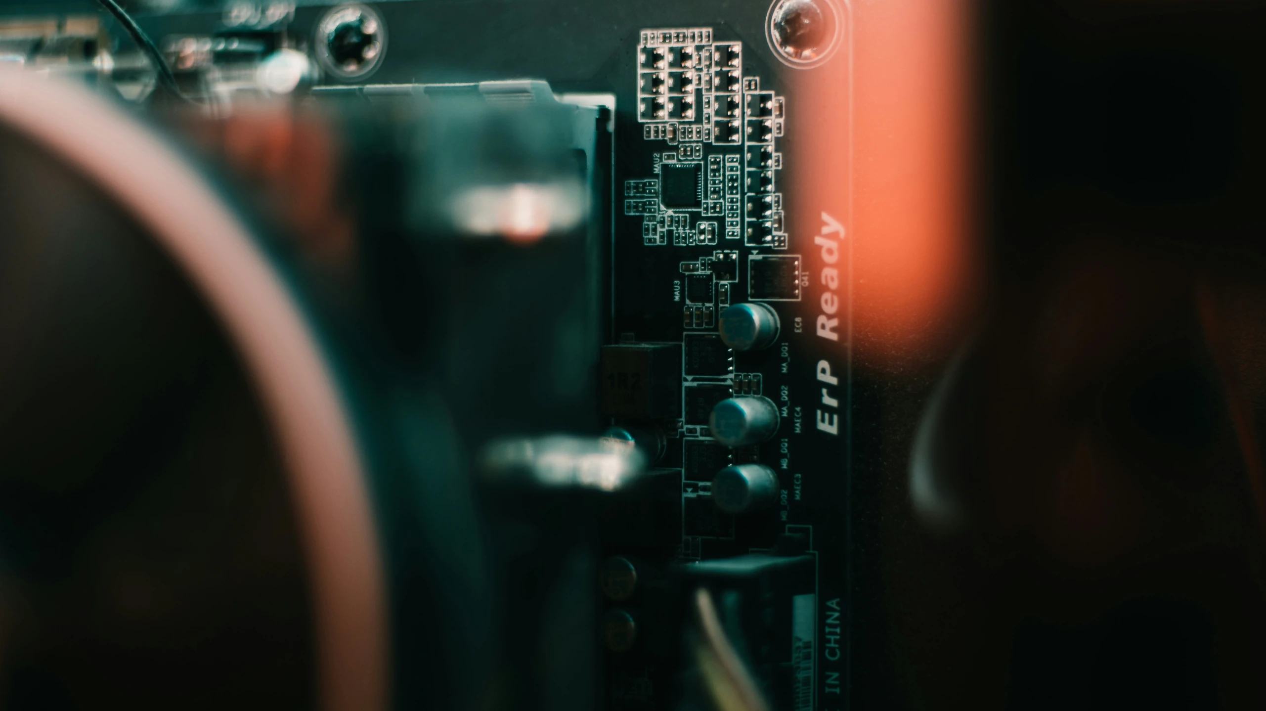 close up view of circuit board in dark room