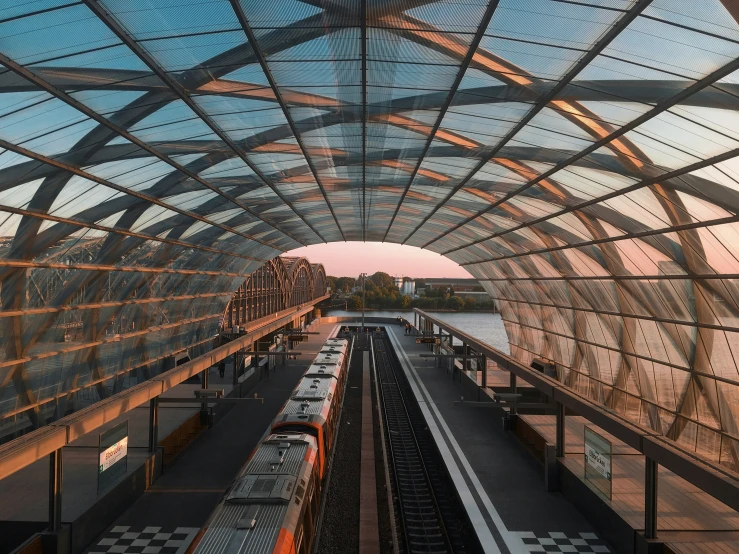 looking down the tracks at an empty train station