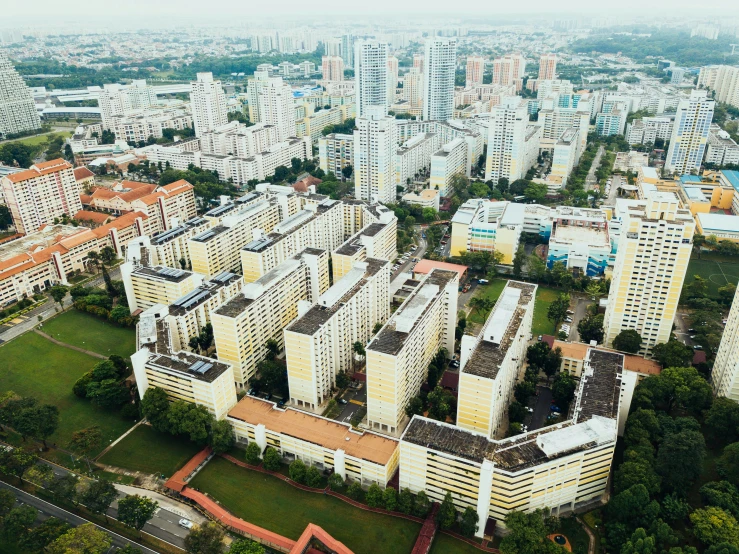 a very large city with tall buildings in the back ground