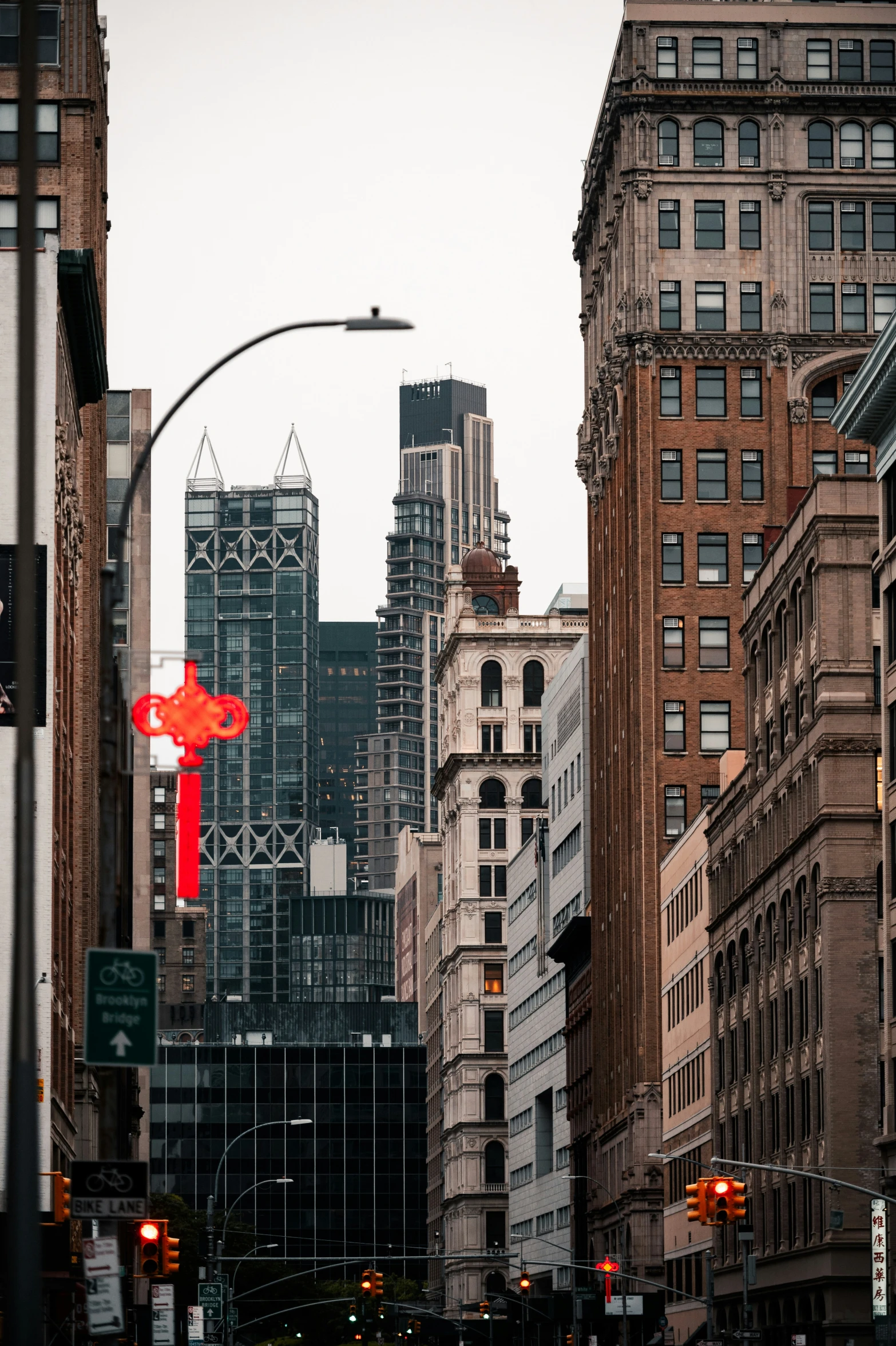 a street light and some buildings in the background