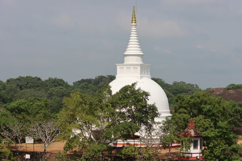 the view of a white temple on a clear day