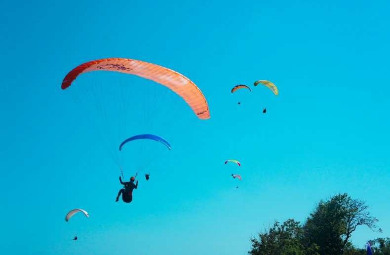 a couple of kites that are flying in the air