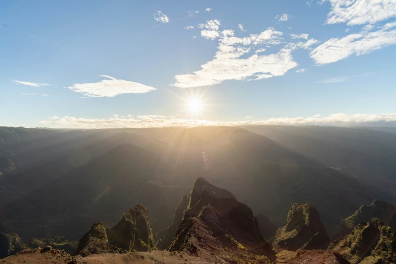 the sun shines brightly as it shines down on some rocks