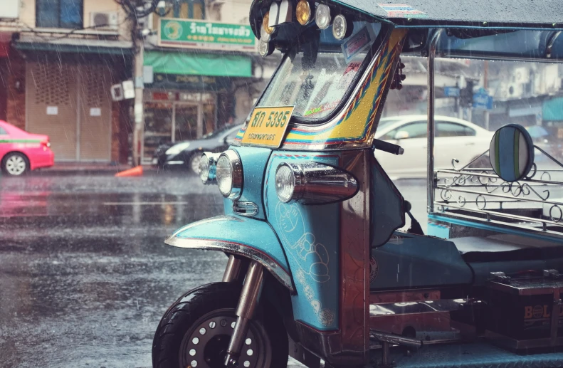 an image of a vehicle that has some items strapped to it