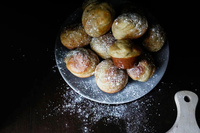 doughnuts are on the plate that is being made