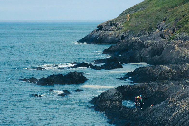 a long view of a large body of water with people on it