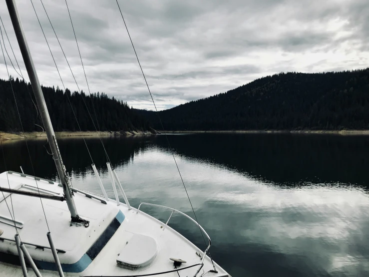 a boat on the water near trees