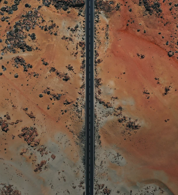 two roads are seen in an aerial view of the desert