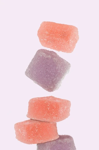 an image of three different colors of candy