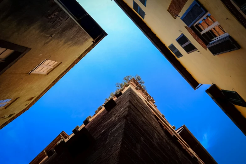 a building is looking up at another building