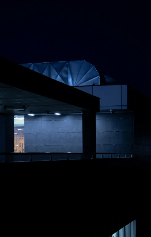 some buildings with a night time sky scene