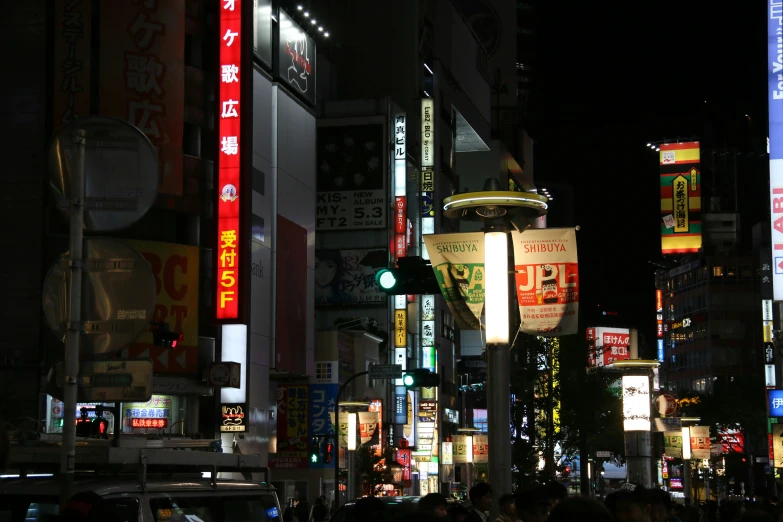 a very busy street in a big city at night