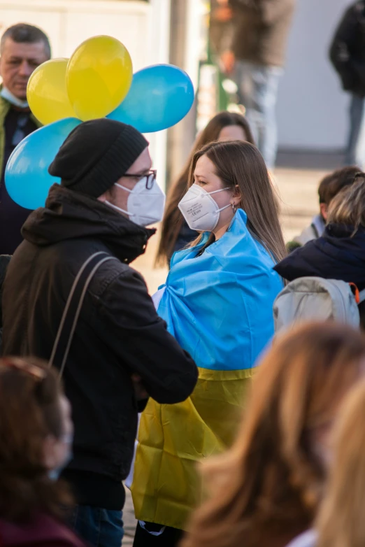 a group of people with face masks are on