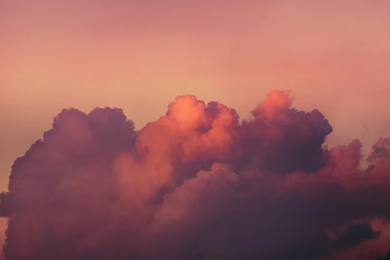 red clouds in the sky as seen from an airplane