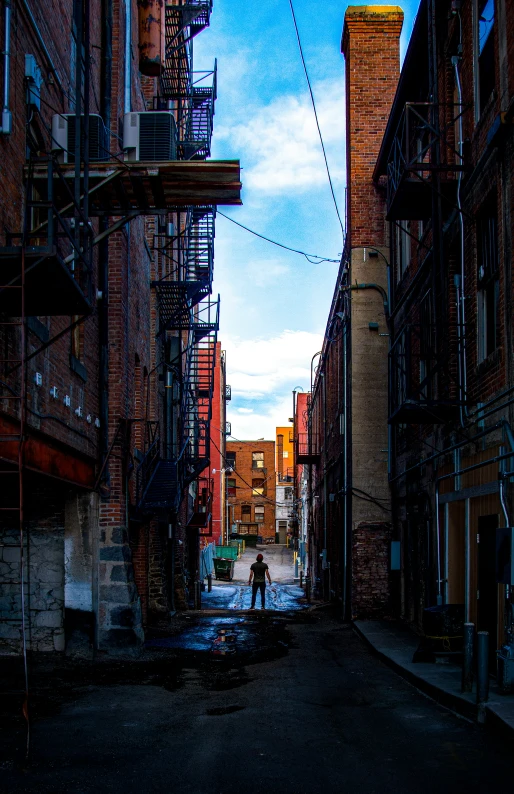 a person walking down the street next to buildings