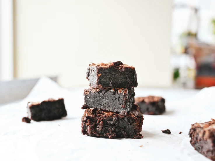 these squares of chocolate are sitting on a table