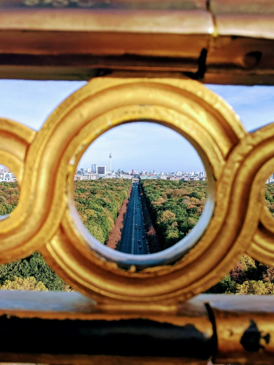 a mirror reflection of the view of a road