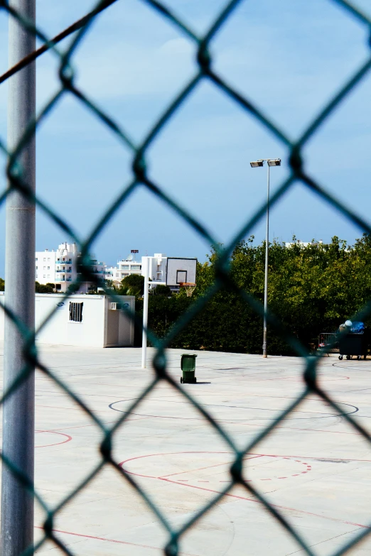 the view through a fence at an urban area