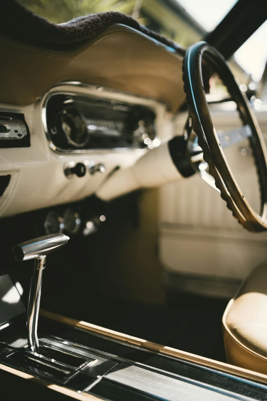 a close up of the dashboard and dash board on an older car