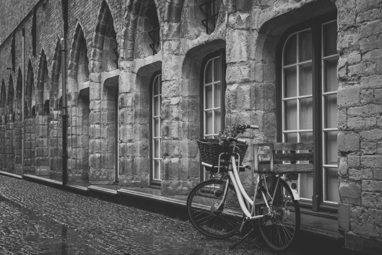 the bike has been parked near the wall