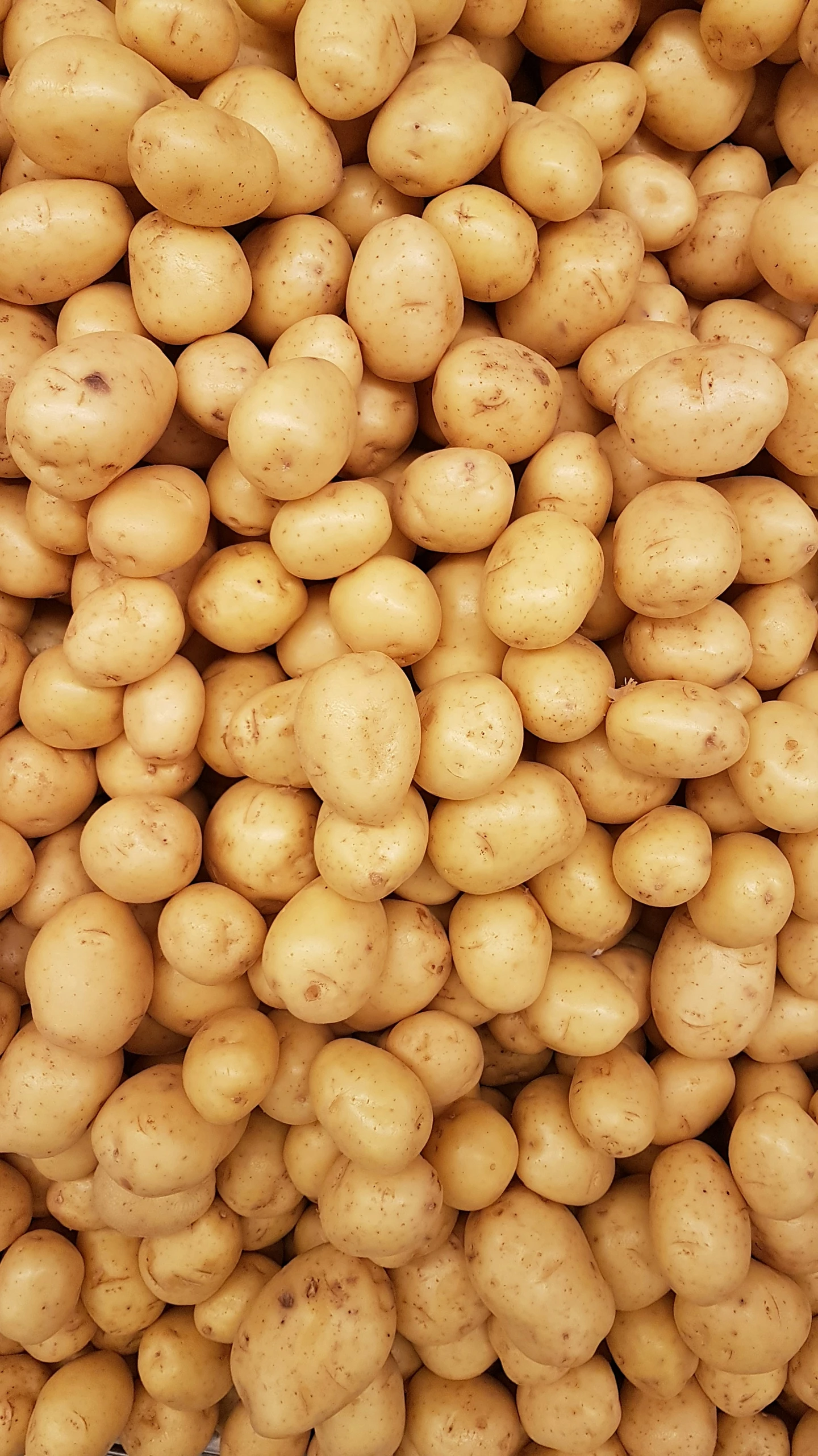 pile of potatoes with holes in the middle