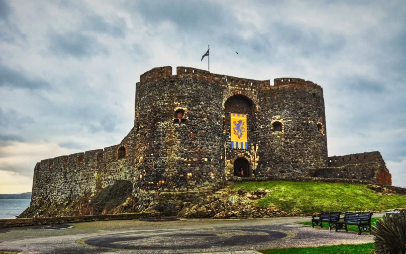 the view of an old castle on the hill