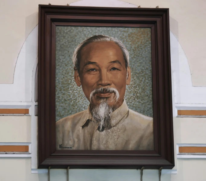 a picture hanging on a wall showing an older man in brown