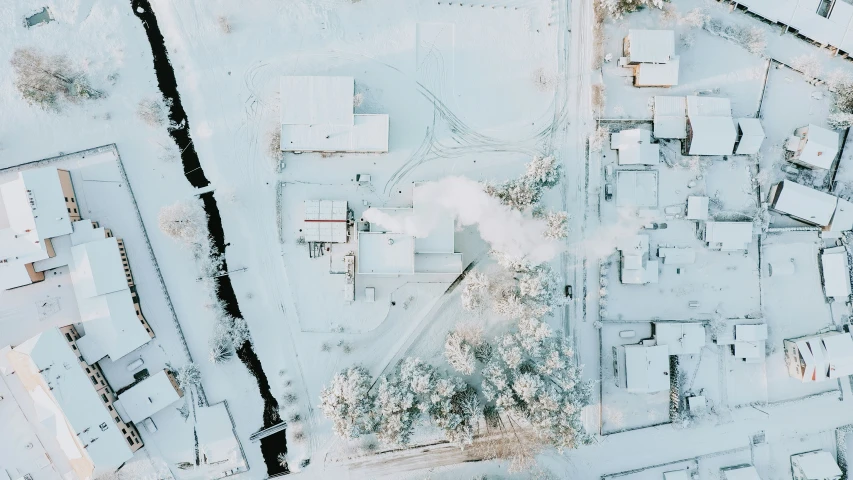 a picture taken from above of snow covered roofs