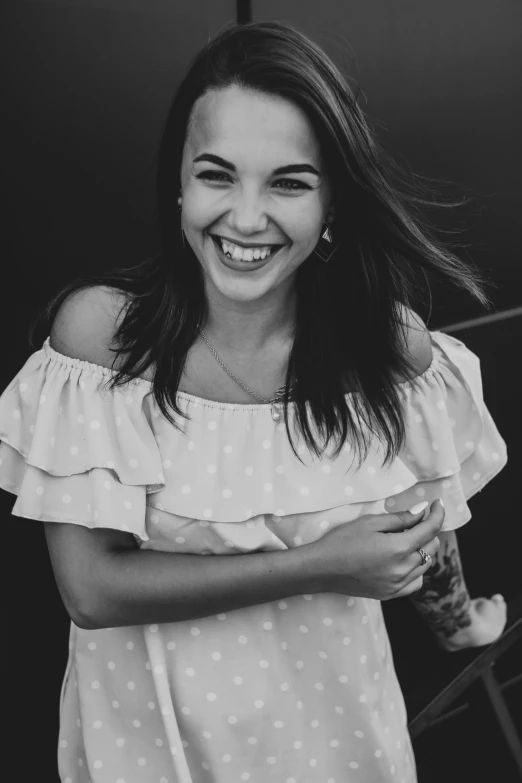black and white pograph of a young woman smiling