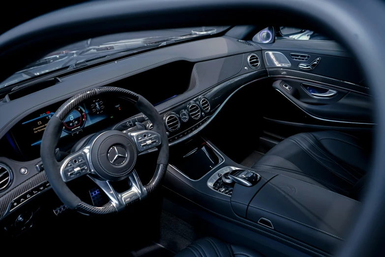 the inside view of the mercedes cls is shown with all black leather seats