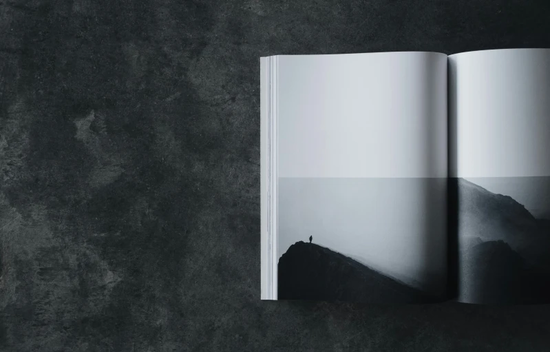 a book open to the story on a dark grey background